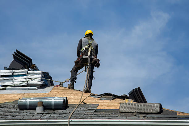 Professional Roof Replacement technician working in Medford, MA